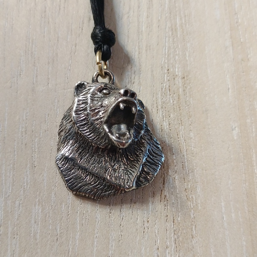 Bear made from sterling silver Artisan from Santa fe 1 inch X 7/8 inch